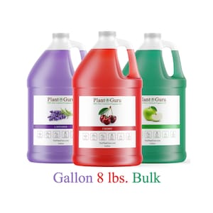 May include: Three gallon-sized bottles of Plant Guru fragrance. The bottles are purple, red, and green, with white labels. The labels read "Lavender", "Cherry", and "Apple Fantasy". The text "Gallon 8 lbs. Bulk" is at the bottom.