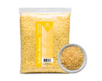 May include: A clear plastic bag filled with yellow beeswax pellets, with a small white bowl of pellets to the right. The bag has a yellow label with the words "Yellow Beeswax" and "Plant Guru". The bag is labeled as 1 lb.