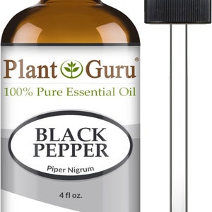 May include: A brown glass bottle of Plant Guru Black Pepper essential oil with a black dropper. The label reads "100% Pure Essential Oil" and "Black Pepper, Piper Nigrum, 4 fl oz."