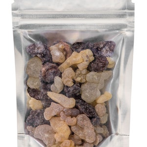 May include: A silver resealable pouch filled with a mixture of brown, tan, and clear resin pieces.