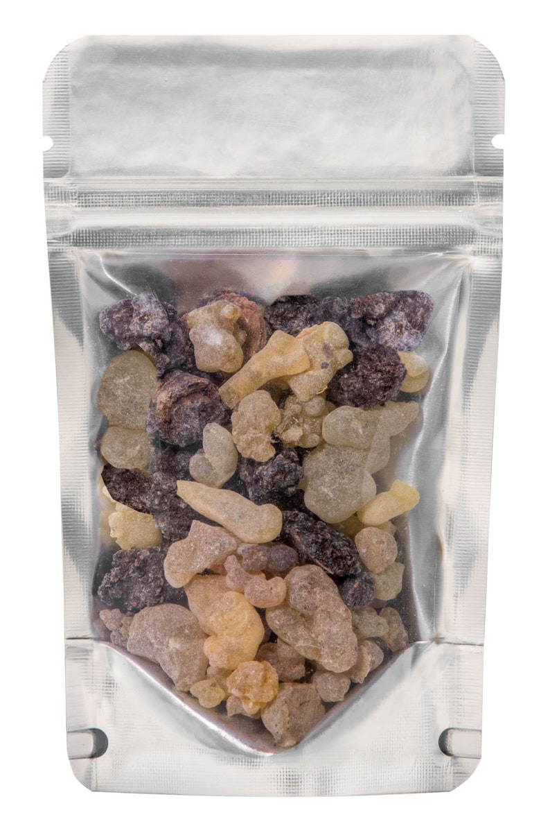 May include: A silver resealable pouch filled with a mixture of brown, tan, and clear resin pieces.
