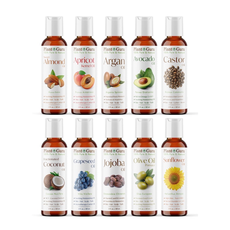 May include: Ten small amber glass bottles with white lids, each containing a different type of oil. The bottles are labeled with the name of the oil, such as Almond Oil, Apricot Kernel Oil, Argan Oil, Avocado Oil, Castor Oil, Fractionated Coconut Oil, Grapeseed Oil, Jojoba Oil, Olive Oil Pomace, and Sunflower Oil. Each bottle has a small image of the source of the oil, such as almonds, apricots, argan nuts, avocados, castor beans, coconuts, grapes, jojoba beans, olives, and sunflowers.