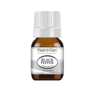 May include: A small amber glass bottle of Plant Guru Black Pepper essential oil. The label reads "Black Pepper Piper Nigrum" and "1/6 fl oz. (5ml)". The bottle has a white cap.