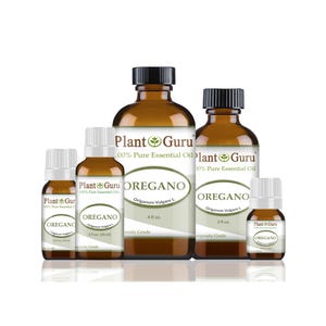Puede incluir: Varias botellas de vidrio &aacute;mbar de aceite esencial de or&eacute;gano, etiquetadas como "Plant Guru". Las botellas, con tapas negras o blancas, muestran el texto "OREGANO" y "100% Pure Essential Oil". Se presentan diferentes tama&ntilde;os.