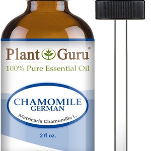 May include: A brown glass bottle of Plant Guru Chamomile German 100% Pure Essential Oil with a black cap and a dropper. The label reads "2 fl oz." and "Therapeutic Grade."