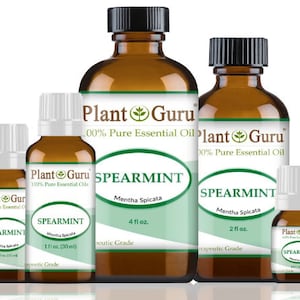 May include: Four amber glass bottles of Spearmint essential oil, labeled "Plant Guru 100% Pure Essential Oils" with varying sizes: 1 fl oz, 2 fl oz, and 4 fl oz. The bottles are arranged from smallest to largest.