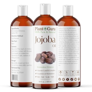 May include: Three amber-coloured bottles of Plant Guru Jojoba Oil. Each bottle has a white cap and a label with the product name, ingredients, and benefits. The bottles contain 473 ml of oil.