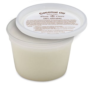 May include: A white plastic container with a white lid. The lid has a label that reads "Coconut Oil Extra Virgin Plant Guru 100% NATURAL". The label also includes a small green plant icon and text describing the benefits of coconut oil.