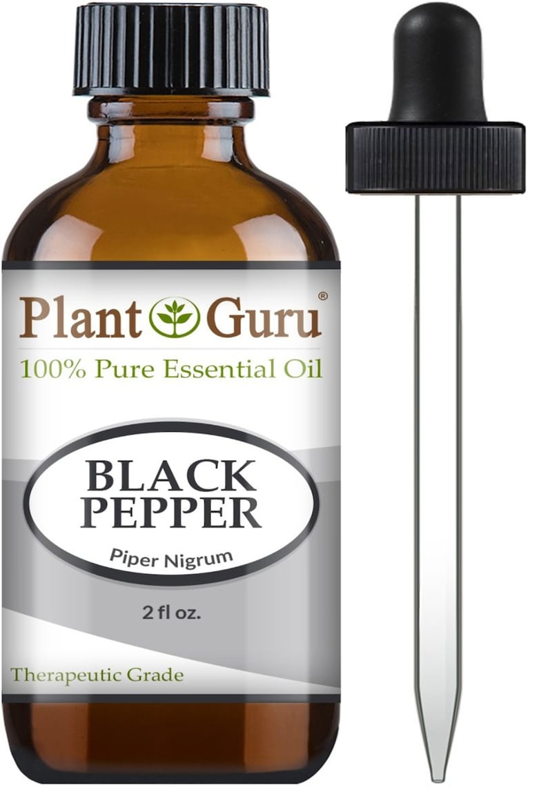 May include: A brown glass bottle of Plant Guru Black Pepper essential oil with a black dropper. The label reads "100% Pure Essential Oil" and "Black Pepper Piper Nigrum 2 fl oz.". The bottle has a black cap.