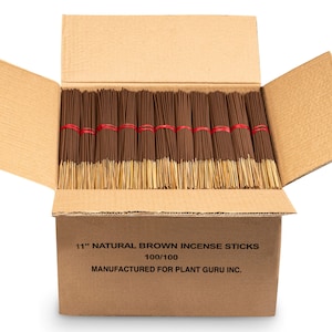 May include: A cardboard box filled with 100 brown incense sticks, each measuring 11 inches in length. The box is labeled "11" NATURAL BROWN INCENSE STICKS 100/100 MANUFACTURED FOR PLANT GURU INC."