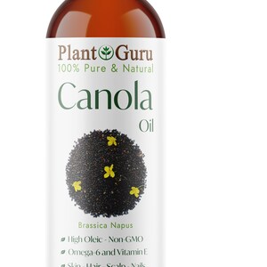 May include: A brown bottle of Plant Guru Canola Oil. The label features the text "Canola Oil" and a graphic of black seeds with yellow flowers. The bottle contains 32 fl. oz. / 946 ml. of oil.