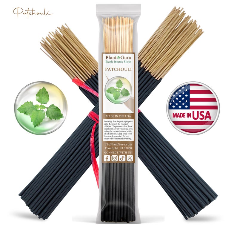 May include: A package of black incense sticks with a label that reads "Plant Guru Exotic Incense Sticks Patchouli" and "Made in the USA". The package is tied with a red ribbon. The image also includes a small image of a patchouli plant and a US flag.