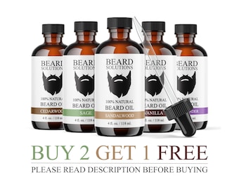 May include: Five brown glass bottles of beard oil with black caps and white labels. The labels feature a beard graphic and the words "BEARD SOLUTIONS." The bottles are labeled with different scents, including Cedarwood, Sage, Sandalwood, Vanilla, and Lavender. A dropper is included.