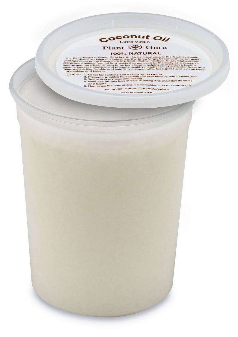 May include: A white plastic container of extra virgin coconut oil with a white lid. The lid has a label that reads "Coconut Oil Extra Virgin Plant Guru 100% Natural". The label also includes a list of uses for the oil, such as cooking, baking, and moisturizing.