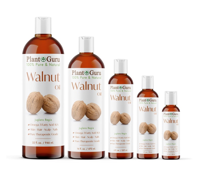 May include: Four bottles of Plant Guru 100% Pure & Natural Walnut Oil in different sizes. The bottles are amber glass with white caps and labels. The labels feature a green leaf logo and the text "Plant Guru" in green and white. The bottles are arranged in a row from largest to smallest. The largest bottle is 32 fl. oz./946 ml., the next is 16 fl. oz./473 ml., the next is 8 fl. oz./237 ml., and the smallest is 2 fl. oz./59 ml.