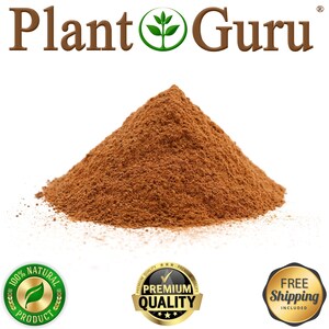 May include: A pile of brown powder, possibly a spice or herb, against a white background. The text "Plant Guru" is at the top. The image also includes seals that say "100% Natural Product", "Premium Quality", and "Free Shipping Included".