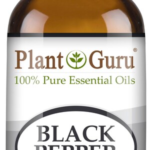 May include: A brown glass bottle of Plant Guru Black Pepper essential oil. The label reads "BLACK PEPPER Piper Nigrum" and "1/3 fl oz. (10 ml)". The bottle has a white cap.