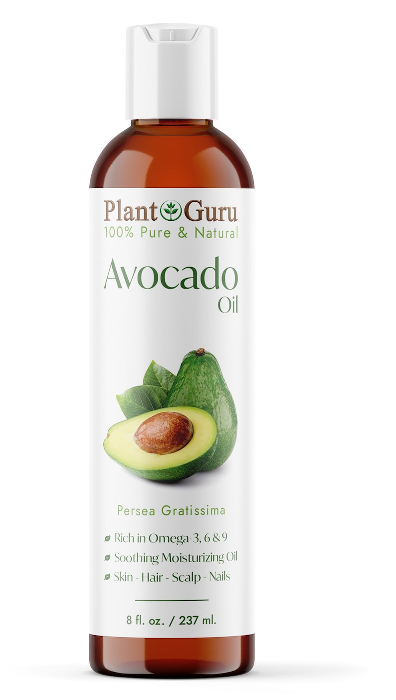 May include: A brown bottle of Plant Guru Avocado Oil with a white cap. The label features an avocado and a cut avocado, with text indicating it's rich in Omega-3, 6 & 9. The bottle contains 8 fl. oz. / 237 ml.