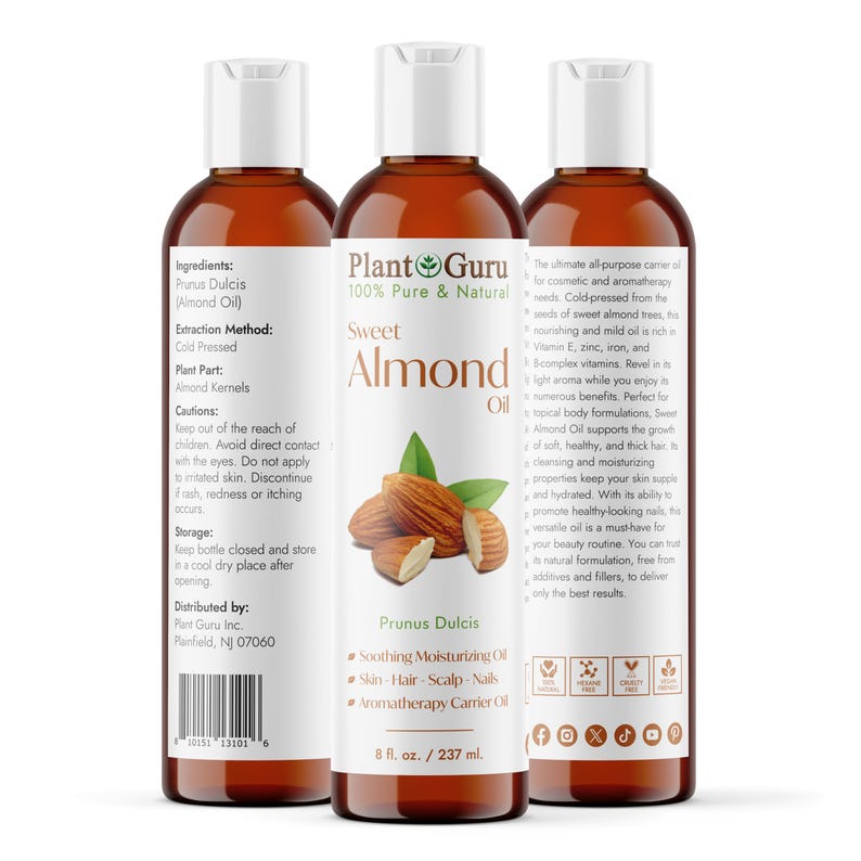 May include: Three brown bottles of Plant Guru Sweet Almond Oil. The labels include the text "100% Pure & Natural" and "Prunus Dulcis". Each bottle contains 8 fl. oz. / 237 ml. The labels also list ingredients and uses.