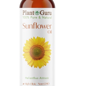 K&ouml;nnte beinhalten: Eine braune Glasflasche mit wei&szlig;em Verschluss, beschriftet mit "Plant Guru 100% Rein & Nat&uuml;rlich Sonnenblumen&ouml;l". Die Flasche zeigt eine Sonnenblume und listet den botanischen Namen "Helianthus Annuus" auf. Au&szlig;erdem wird angegeben, dass das &Ouml;l hoch oleins&auml;urehaltig, nicht gentechnisch ver&auml;ndert, reich an Vitamin A, C und E ist und f&uuml;r Haut, Haare, Kopfhaut und N&auml;gel geeignet ist. Die Flasche enth&auml;lt 237 ml.