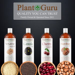 May include: Four bottles of Plant Guru oils: Sesame Seed Oil, Canola Oil, Cherry Kernel Oil, and Hazelnut Oil. Each bottle is brown with a white cap. Ingredients are displayed in wooden bowls below each bottle. The text "Quality You Can Trust" is above the bottles.