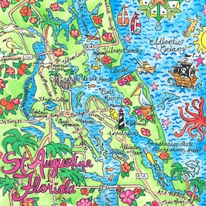 May include: A hand-drawn map of St. Augustine, Florida, with colorful illustrations of landmarks, waterways, and local businesses. The map features a pink flamingo, a pirate ship, and a lighthouse.