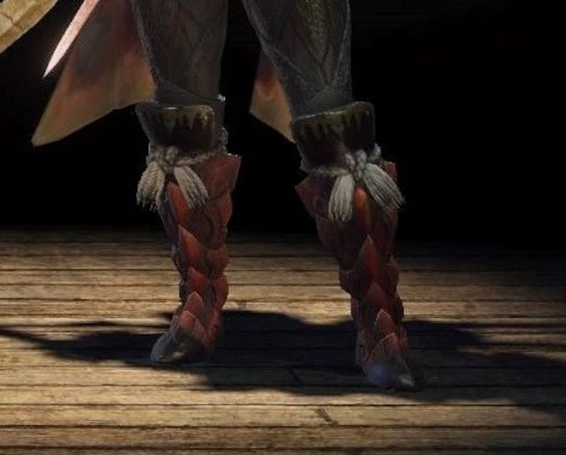 May include: Red and brown leather boots with white straps and buckles. The boots have a pointed toe and a high heel.