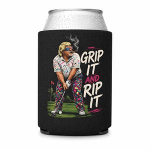May include: Black can cooler with a cartoon golfer smoking a cigar, wearing an eye patch and colourful golf attire. The text "GRIP IT AND RIP IT" is displayed in white and pink. The design is on a black background.