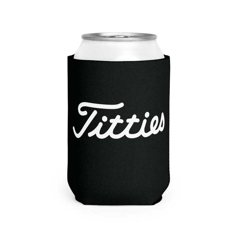 May include: Black can cooler with white cursive text that reads "Titties".