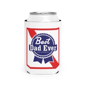 May include: White can cooler with a red and blue design. The design features a blue ribbon with the words "Best Dad Ever" and "Now and Forever" in white text. The cooler is designed to keep beverages cold.