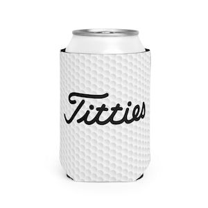 May include: White golf ball patterned can cooler with the word "Titties" in black cursive lettering.