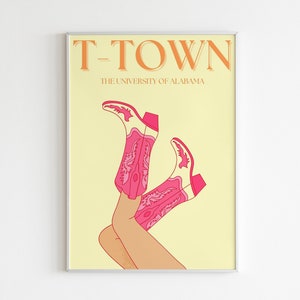 May include: A yellow poster with the text "T-Town The University of Alabama" in orange. The poster features a pair of pink cowboy boots with white accents.
