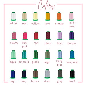 May include: A color chart displaying twenty-four spools of embroidery thread arranged in four rows of six. Each spool is labeled with its corresponding color name, including white, oat, yellow, gold, orange, light pink, mauve, hot pink, red, plum, lilac, purple, aqua, emerald, green, sage, baby blue, turquoise, sky, navy, brown, silver, gray, and black.