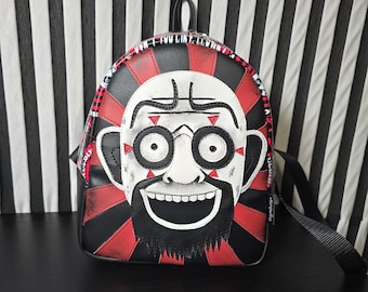 Mochila pequeña con forma de marioneta de payaso hecha a mano