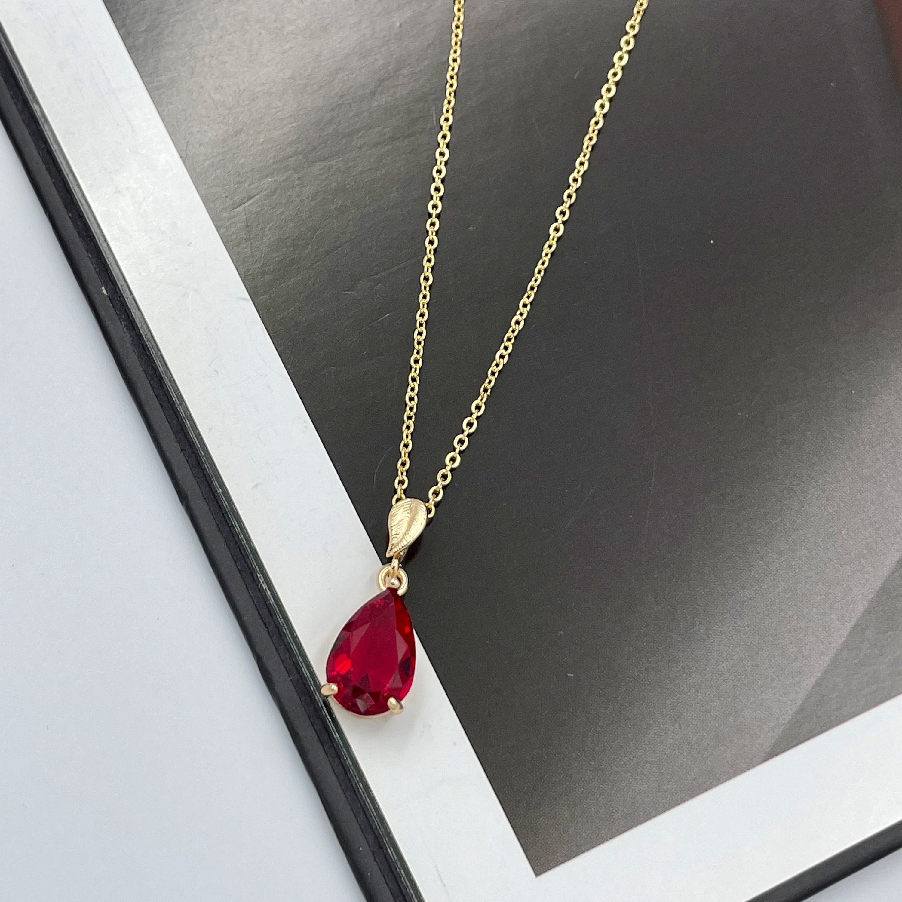 Red gem hotsell necklace