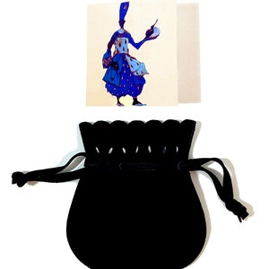 May include: A black velvet drawstring bag with a scalloped edge. The bag is empty and ready to be filled with a gift.