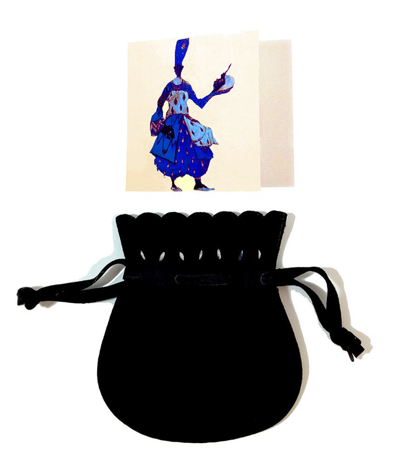 May include: A black velvet drawstring bag with a scalloped edge. The bag is empty and ready to be filled with a gift.