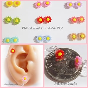 May include: Assortment of colorful daisy flower earrings with plastic clip or plastic post backs. The earrings are shown on a white background and on a model's ear. The earrings are also shown next to a US quarter for size reference. "Plastic Clip or Plastic Post" is written in the image.