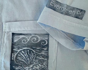 Shell & Waves Hand-Printed Linocut Comfort Colors Adult Unisex Pocket T-shirt