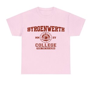 May include: Pink t-shirt with a red print that says "Byrgenwerth College" with an all-seeing eye logo and the text "Fear the Old Blood".