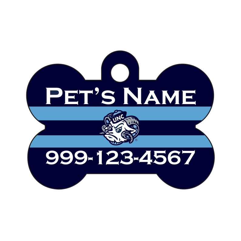 May include: Blue and white bone-shaped pet ID tag with a UNC Tar Heels logo and the text "PET'S NAME" and "999-123-4567".