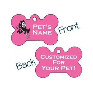 May include: Pink bone-shaped dog tag with a black and white illustration of a devil on the front. The text "PET'S NAME" is on the front of the tag. The back of the tag says "CUSTOMIZED FOR YOUR PET!"