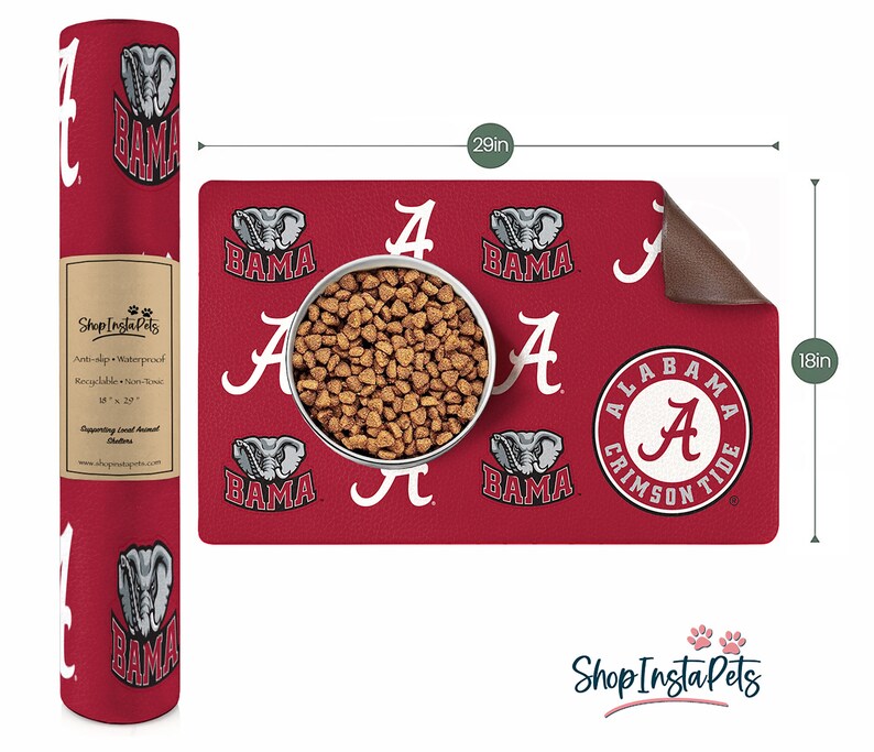May include: Red and white Alabama Crimson Tide pet feeding mat with a non-slip, waterproof surface. The mat features a repeated pattern of the Alabama 'A' logo, an elephant, and the word 'BAMA'. The mat measures 18 inches by 29 inches.