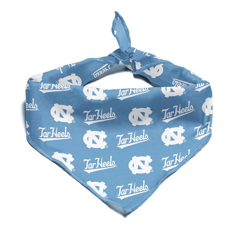 May include: A light blue bandana with a white repeated pattern of the University of North Carolina Tar Heels logo and the words "Tar Heels".