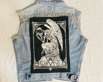 My first vest. Sewing patches over pockets is hard. I'm waiting for my back  patch to come in the mail. But I feel proud of myself so far. :  r/BattleJackets