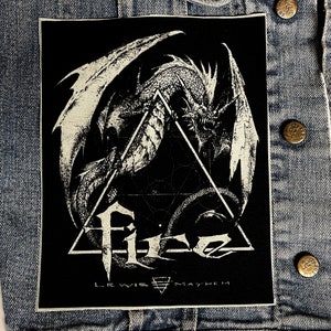 May include: Black and white embroidered patch featuring a dragon with wings spread wide, inside a triangle with the text "LEWIS MAYHEM" at the bottom.