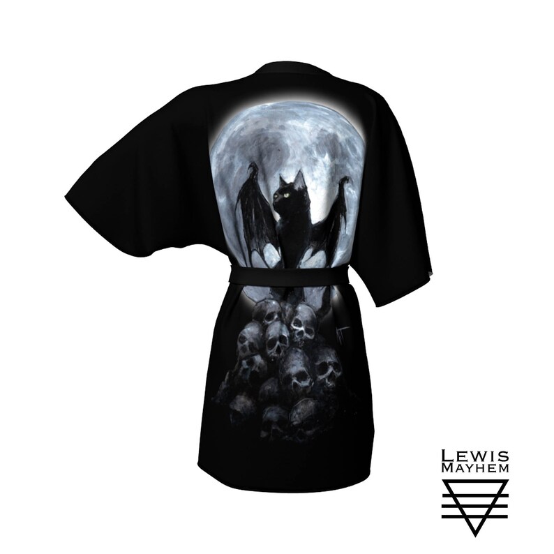 May include: Black kimono robe with a full moon, a black cat with bat wings, and a pile of skulls printed on the back. The text "LEWIS MAYHEM" is printed on the bottom right corner of the robe.