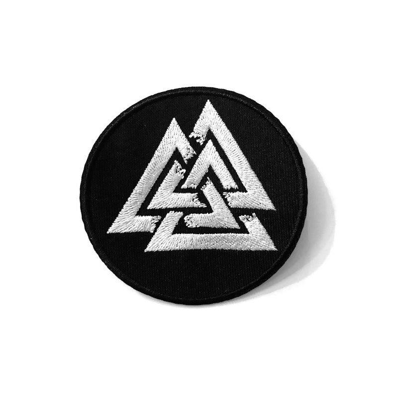 May include: A black embroidered patch featuring a white Valknut symbol, a Norse symbol representing the connection between the realms of the gods, the living, and the dead.