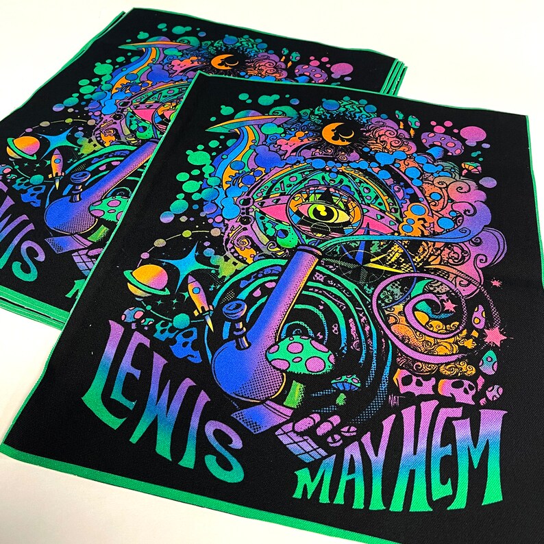 May include: Black and green fabric patch with a psychedelic design featuring a large, colorful bong, a swirling eye, and the text "Lewis Mayhem".