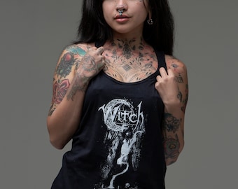 May include: Black tank top with a white graphic of a witch and the word "Witch" in a stylised font. The tank top has a scoop neck and a relaxed fit.